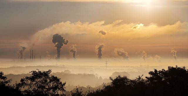 Industrial smoke pollution, exemplifying how industrial activities release harmful contaminants into the environment