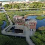 Protected natural area with diverse ecosystems, wildlife, and sustainable human activities in a biosphere reserve.